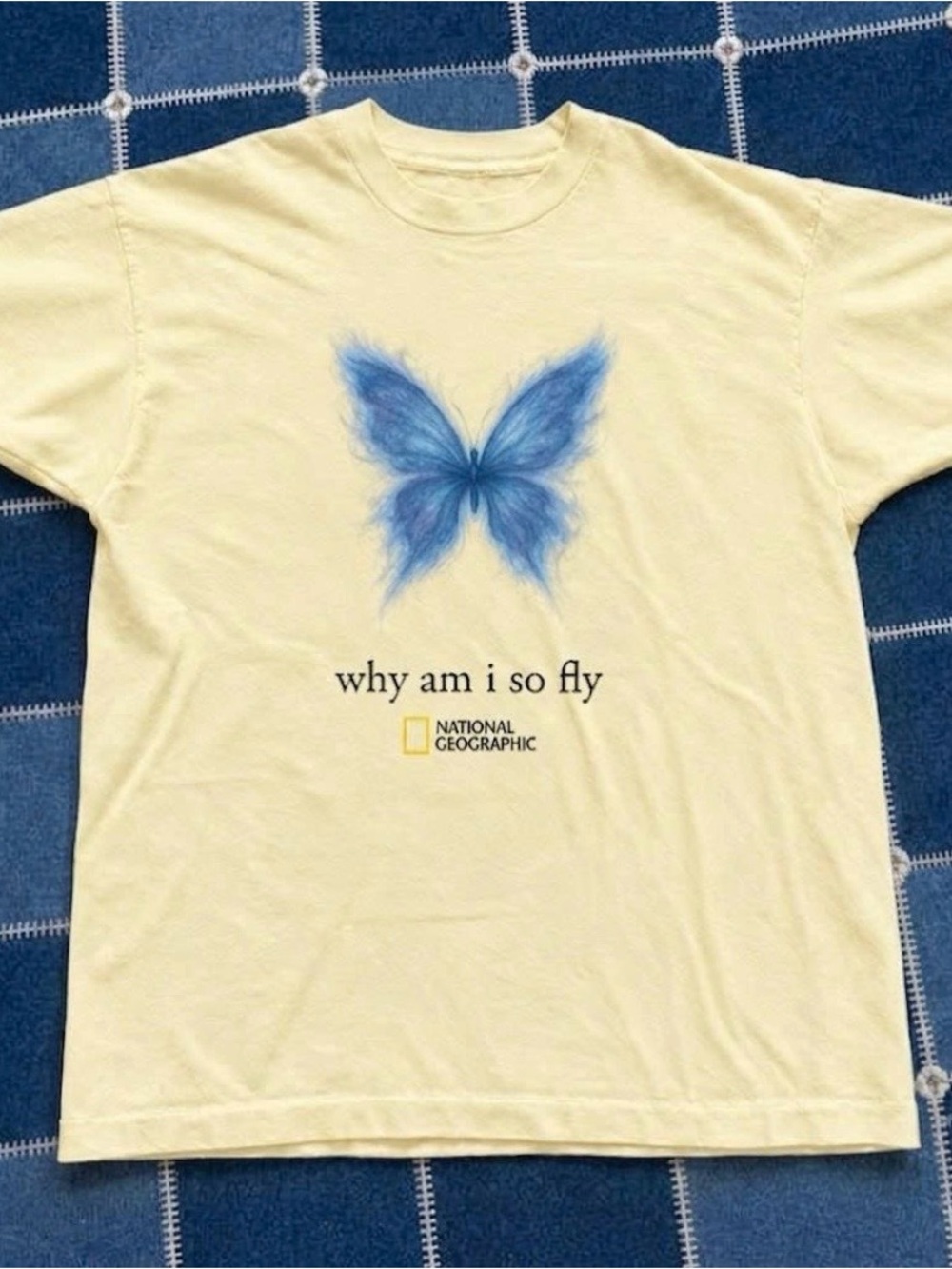 National Geographic Pale Yellow Tee with Blue Butterfly Graphic